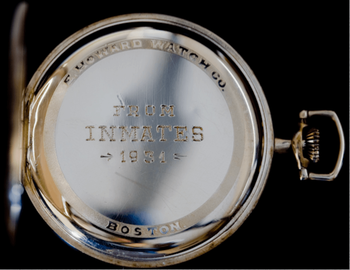 The Inmates' Watch - front view of gold pocket watch